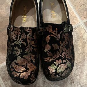 Alegria Black and Bronze Floral Clogs